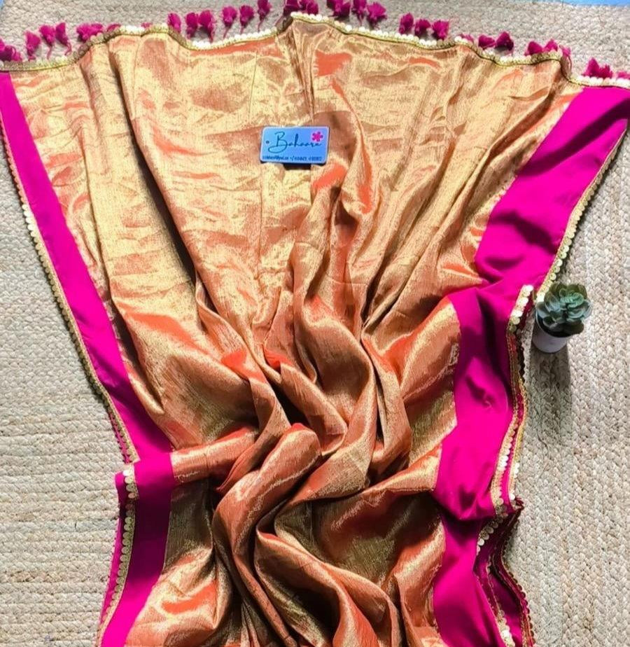 Megha | Golden Orange Tissue Saree with Rani Pink Border