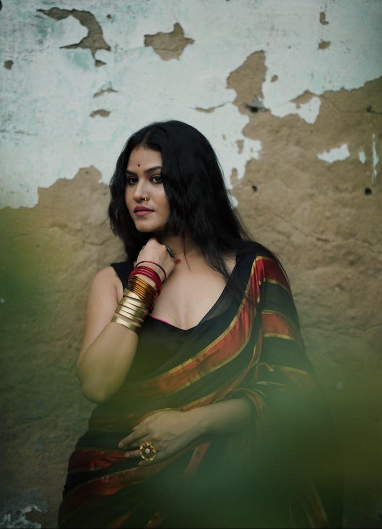 Noor | Party Black and Ruby Red Mul Mul Cotton Saree with Golden Zari Stripe