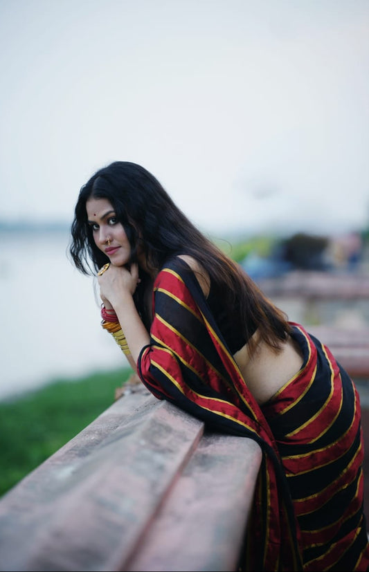 Noor | Party Black and Ruby Red Mul Mul Cotton Saree with Golden Zari Stripe