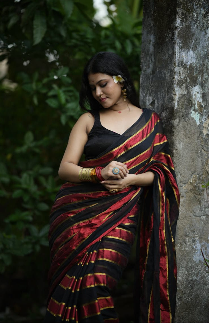 Noor | Party Black and Ruby Red Mul Mul Cotton Saree with Golden Zari Stripe