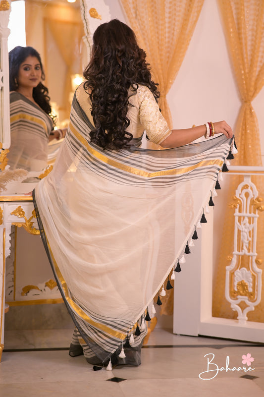 Noor | Off White and Black Mul Mul Cotton Saree with Golden Zari Border