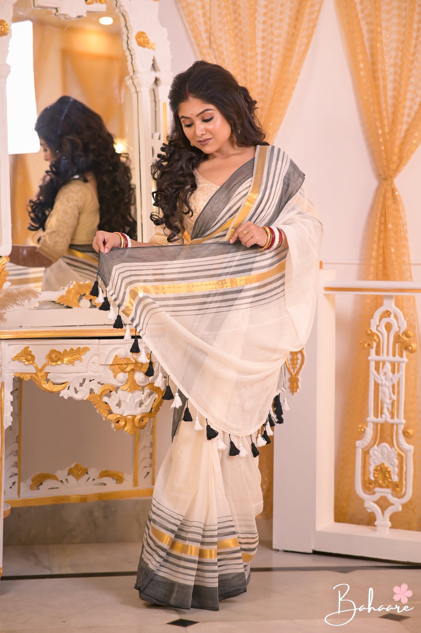 Noor | Off White and Black Mul Mul Cotton Saree with Golden Zari Border