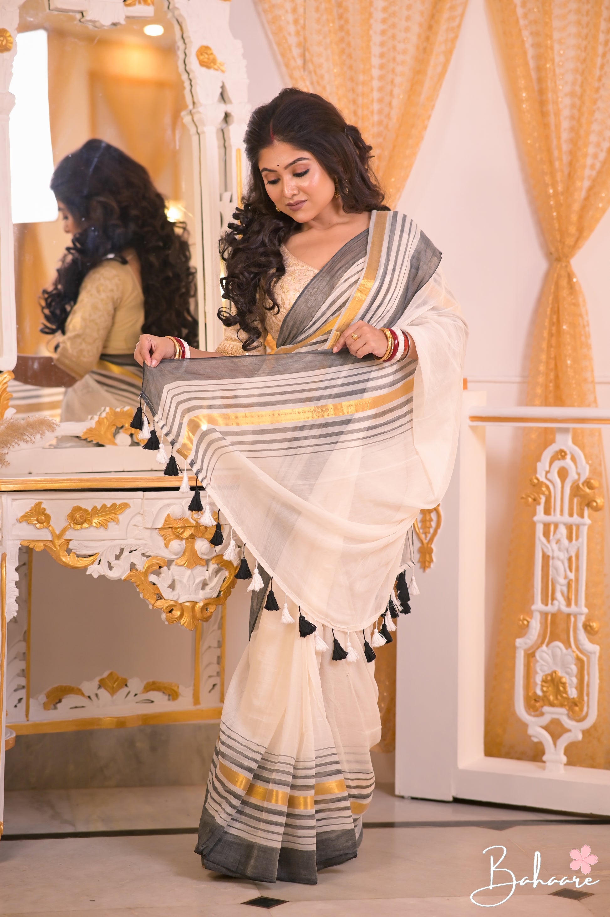 Noor | Off White and Black Mul Mul Cotton Saree with Golden Zari Border