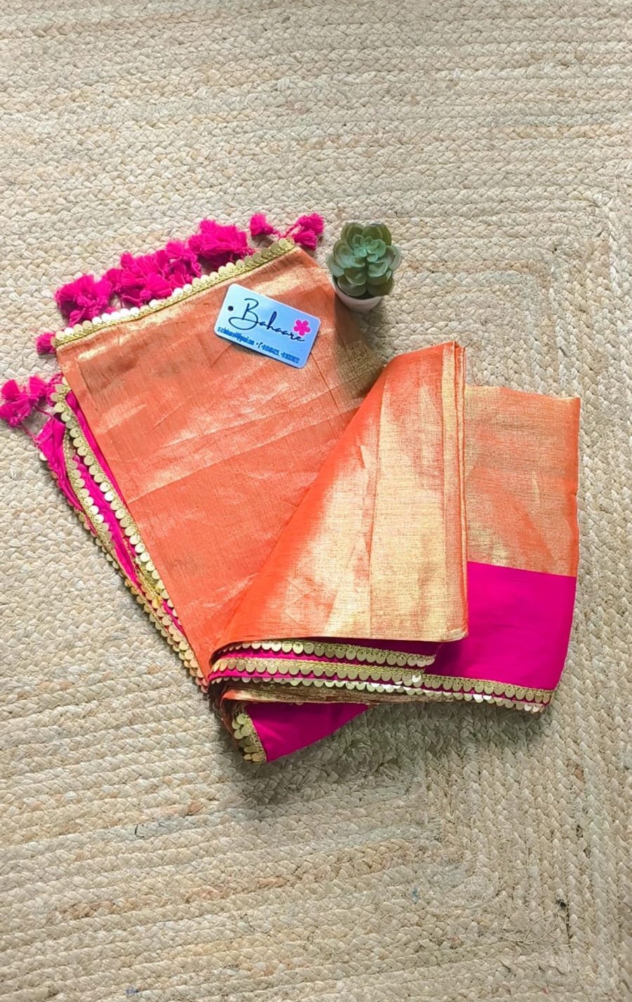 Megha | Golden Orange Tissue Saree with Rani Pink Border