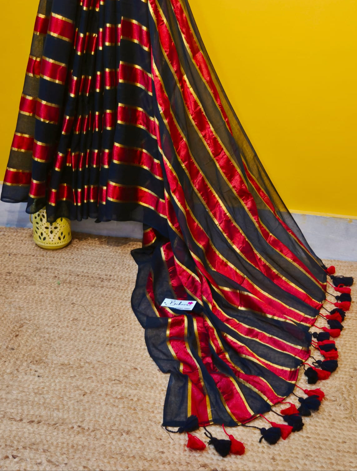 Noor | Party Black and Ruby Red Mul Mul Cotton Saree with Golden Zari Stripe