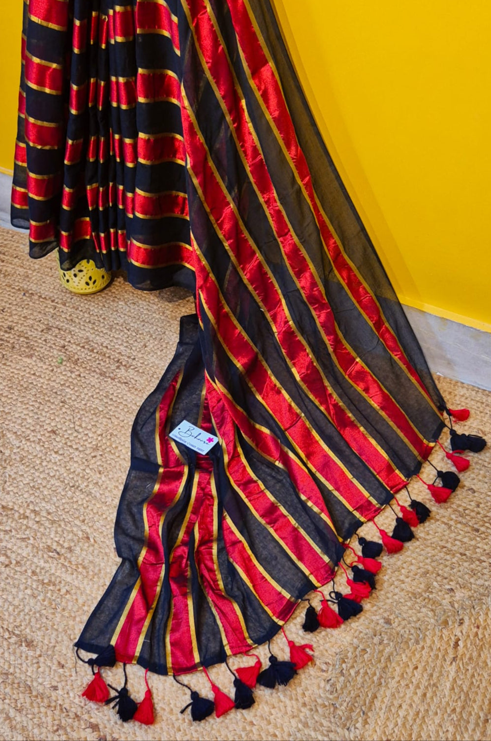 Noor | Party Black and Ruby Red Mul Mul Cotton Saree with Golden Zari Stripe