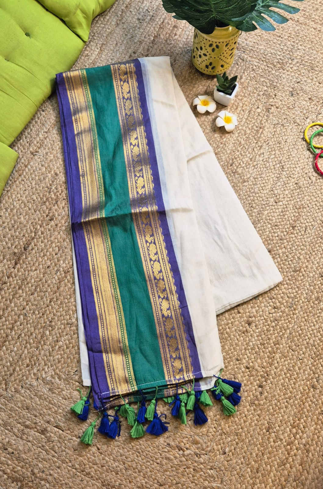 Noor | Floral White Mul Mul Cotton Saree with Rama Green and Blue Zari Border