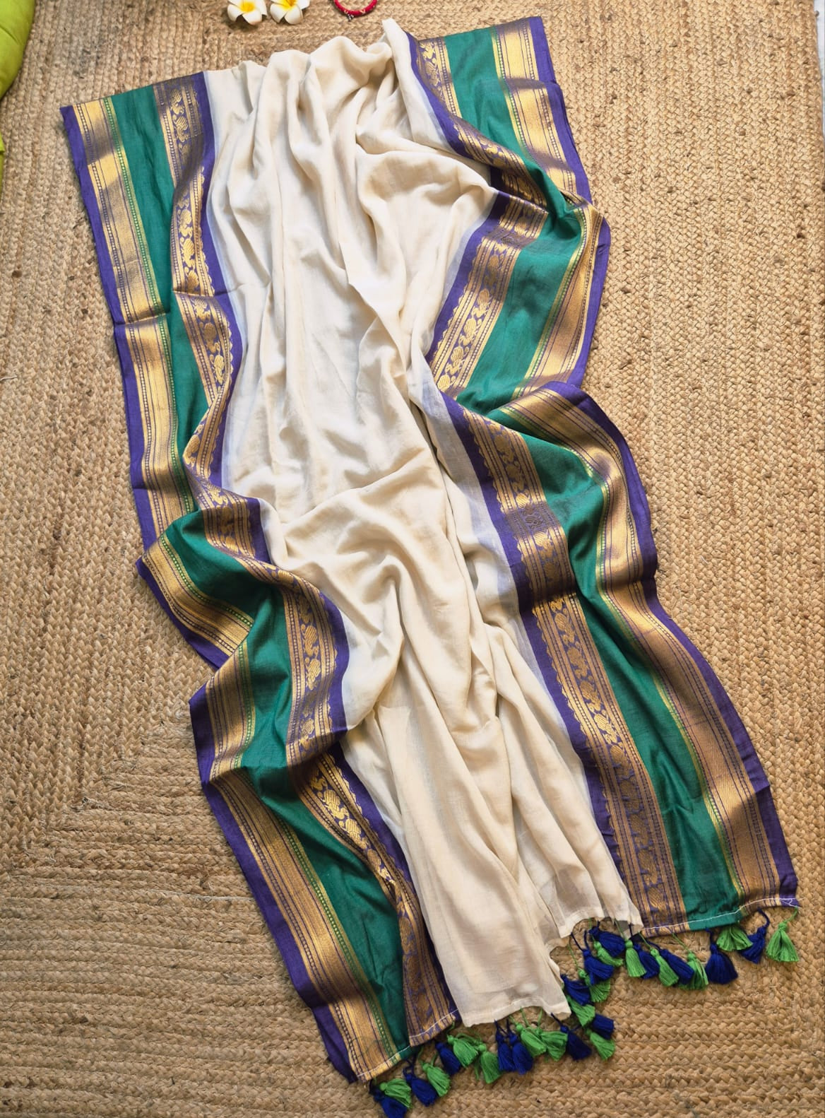 Noor | Floral White Mul Mul Cotton Saree with Rama Green and Blue Zari Border